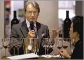  ?? George Rose Getty Images ?? WINE AUTHORITY Spurrier, shown in 2014, organized a blind taste-off between Napa and French wines in the 1970s.