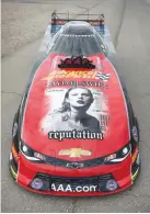  ??  ?? NHRA Funny Car driver Courtney Force’s Advance Auto Parts Chevrolet Camaro SS funny car is seen featuring the cover Taylor Swift’s new album Reputation at Las Vegas Motor Speedway on Oct. 30. Swift’s album debuts on Nov. 10.