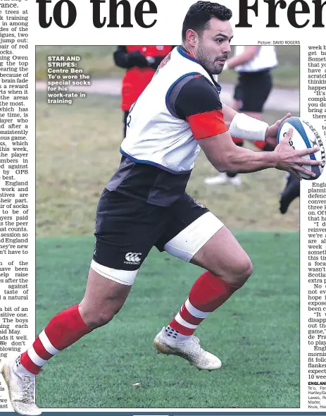  ?? Picture: DAVID ROGERS ?? STAR AND STRIPES: Centre Ben Te’o wore the special socks for his work-rate in training