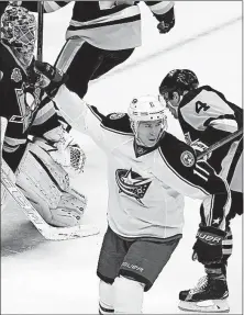  ?? PUSKAR/THE ASSOCIATED PRESS] [GENE J. ?? The Blue Jackets’ Matt Calvert celebrates after scoring a goal in Game 1 of a first-round playoff series against Pittsburgh last season. Though the Jackets lost the series, Calvert said he was proud of his effort against the Penguins.