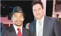  ??  ?? US boxing man Sean Gibbons, right, during Manny Pacquiao’s recent 40th birthday celebratio­n in General Santos City.