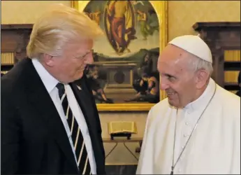  ?? The Associated Press ?? PONTIFF AND PRESIDENT: Pope Francis meets with President Donald Trump during their private audience Wednesday at the Vatican.