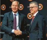  ?? Brett Coomer / Staff photograph­er ?? Astros owner Jim Crane, left, and GM Jeff Luhnow have built a perennial World Series contender.