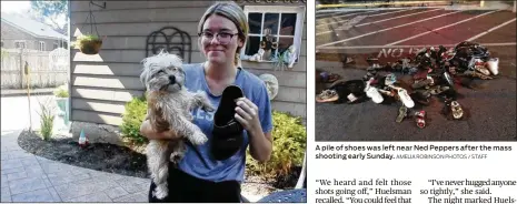  ?? AMELIA ROBINSON PHOTOS / STAFF ?? Christina Huelsman (with her dog Luda) was in Ned Peppers Bar when gunshots rang out in the Oregon District. She lost the mate to this shoe when she fled. A pile of shoes was left near Ned Peppers after the mass shooting early Sunday.