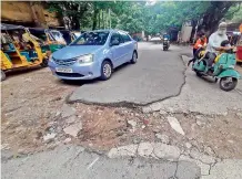  ?? — P. SURENDRA ?? The road in Vijaynagar Colony, Hyderabad, damaged in rains lies unattended posing a threat to road users.