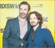  ?? Suzanne Cordeiro AFP / Getty Images ?? JON HAMM, left, joins director Edgar Wright at the premiere of their movie “Baby Driver” on Saturday.