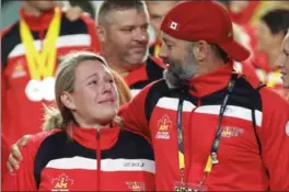  ?? BERNARD WEIL, TORONTO STAR ?? Canadian athletes get emotional as they enter during closing ceremonies.