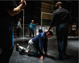  ?? PHOTOS BY ERIN CLARK/GLOBE STAFF ?? From left: Eric Tucker directs a rehearsal of “Angels in America” at Central Square Theater; Eddie Shields and Maurice Emmanuel Parent rehearsing a scene.