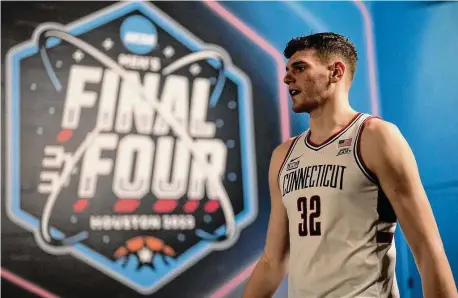  ?? David J. Phillip/Associated Press ?? UConn center Donovan Clingan leaves after a news conference in preparatio­n for the Final Four on Thursday in Houston.