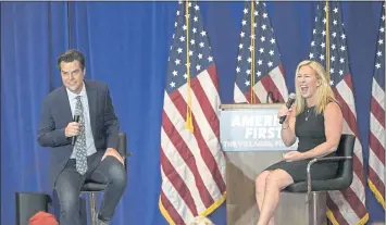  ?? PHELAN M. EBENHACK — THE ASSOCIATED PRESS ?? Rep. Matt Gaetz, R-Fla., left, and Rep. Marjorie Taylor Greene, R-Ga., address attendees at a rally in The Villages, Fla., in May. A third event venue in California has canceled a Saturday night rally planned by the pair.