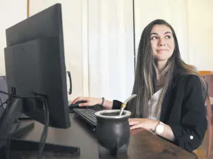  ?? ?? Argentinia­n postdoctor­al researcher in distribute­d systems Marianela Morales sits at her work station in her Madrid home, Spain, April 19, 2024.