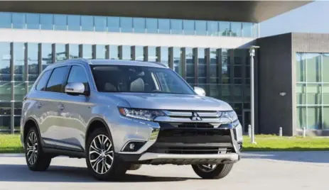  ?? MITSUBISHI ?? The Mitsubishi Outlander PHEV is expected to get just more than about 50 kilometres on a single charge, a little more than half of the Chevrolet Volt.