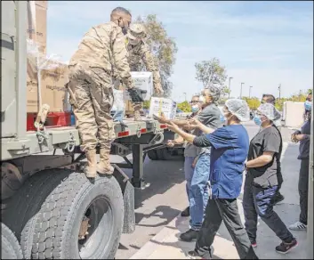  ??  ?? Gov. Steve Sisolak deployed the National Guard in April to combat a surge in COVID-19 cases at nursing homes. Among its jobs were deep cleaning and providing equipment.