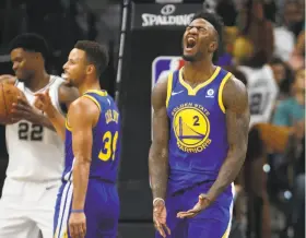  ?? Ronald Cortes / Getty Images ?? The Warriors are hoping rookie forward Jordan Bell (2) can become a valued piece of a championsh­ip roster already loaded with superstars.