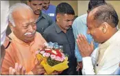  ??  ?? Himachal Pradesh Chief Minister Jai Ram Thakur greets Rashtriya Swayamseva­k Sangh (RSS) chief Mohan Bhagwat during a meeting, at Solan district, last Wednesday