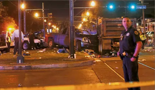  ?? — Reuters ?? Bane on the parade: A vehicle is seen crashed along the Endymion parade route at Orleans and Carollton during Mardi Gras in New Orleans, Louisiana.