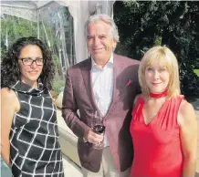  ??  ?? Alberta Ballet’s Melissa Bell, left, with past Banff Centre board chair Robert Walker and his wife Barb Walker.