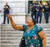  ?? DEMETRIUS FREEMAN/NEW YORK TIMES ?? Emerald Garner, the sister of Eric Garner, screams ‘no justice, no peace’ Tuesday outside of the U.S. Attorney’s Office in Brooklyn, N.Y., after the Justice Department decided that it will not bring federal charges against a New York City police officer in the death of Eric Garner.