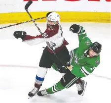  ?? BRUCE BENNETT/GETTY IMAGES ?? Nazem Kadri of the Colorado Avalanche, seen checking John Klingberg of the Dallas Stars during action on Wednesday night, says sitting out the game in protest had crossed his mind.