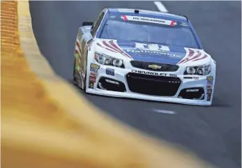  ?? SARAH CRABILL, GETTY IMAGES ?? Dale Earnhardt Jr., entering the final 25 races of his NASCAR career, takes a practice spin around Charlotte Motor Speedway on Thursday in preparatio­n for the Coca-Cola 600.