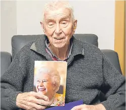  ?? Pictures: Vicki Wightman. ?? Jim Crombie celebrates his 108th birthday, top, and with his telegram from the Queen, above.
