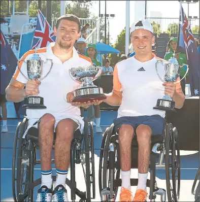  ??  ?? Gordon Reid, right, and doubles partner Joachim Gerard celebrate their success at the Australian Open