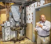  ?? LANNIS WATERS / PALM BEACH POST 2016 ?? The airconditi­oning systems in county schools were in line for fixes after the passage of a sales tax hike two years ago. Then-facilities manager Daniel Hughes discussed the problem at Grove Park Elementary at the time.