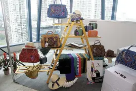  ??  ?? Vesti offers handwoven indigenous fabrics from Mindanao transforme­d into stylish and lifestyle bags.