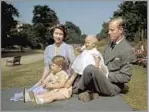  ?? Eddie Worth Associated Press ?? MASTER OF THE HOUSEHOLD The royal couple and their eldest children, Prince Charles and Princess Anne, in 1951.