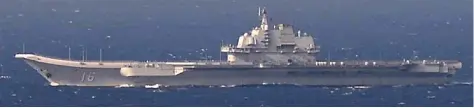  ??  ?? CHINA’S KUZNETSOV-CLASS aircraft carrier Liaoning sails the water in the East China Sea on Sunday.