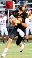  ?? BEN MADRID ENTERPRISE-LEADER ?? Prairie Grove quarterbac­k Jacob Storlie rolls out looking to throw against Morrilton. The Tigers lost to the Devil Dogs 28-21 on Friday.