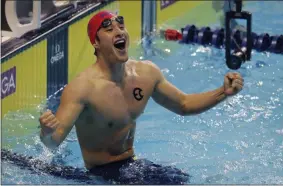  ?? JOHN LOCHER - THE ASSOCIATED PRESS ?? Daiya Seto celebrates after his swim in the the men’s 400-meter individual medley during an Internatio­nal Swimming League event Friday, Dec. 20, 2019, in Las Vegas.