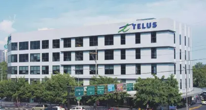  ??  ?? Located at the corner of EDSA and McKinley Road, TELUS House is accessible to various modes of public transporta­tion and safe covered walkways, as well as the convenienc­e store Family Mart and healthcare facility QualiMed at the ground floor.