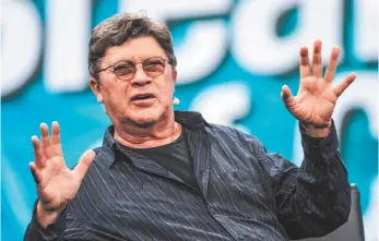  ?? AP FILE PHOTO ?? Songwriter-musician Robbie Robertson is seen here as he spoke at the National Associatio­n of Music Merchants’ Breakfast of Champions event in 2017 in Anaheim, Calif.