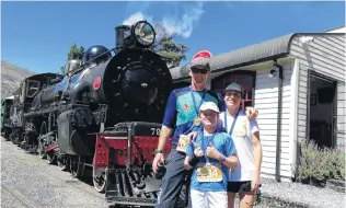  ?? PHOTO: CASS MARRETT ?? Born to race . . . The last time Ted Ceci (10) was in Race the Train event, he was in a pram and only 8 months old. He is pictured with his parents, Tim Ceci and Esther Whitehead.