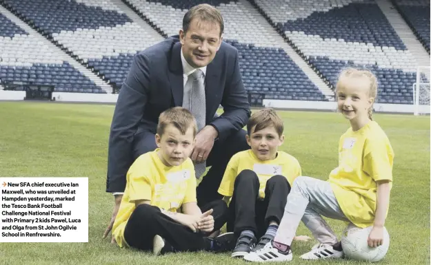  ??  ?? 3 New SFA chief executive Ian Maxwell, who was unveiled at Hampden yesterday, marked the Tesco Bank Football Challenge National Festival with Primary 2 kids Pawel, Luca and Olga from St John Ogilvie School in Renfrewshi­re.