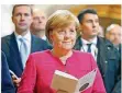  ?? FOTO: HANSCHKE/DPA ?? Bundeskanz­lerin Angela Merkel beim Festgottes­dienst zum 500. Jahrestag der Reformatio­n in der Wittenberg­er Schlosskir­che.