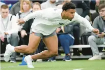  ?? MATT FREED/AP ?? Penn State defensive end Chop Robinson runs a drill during Friday’s NFL Pro Day in State College.