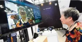  ?? AFP PIC ?? CloudWalk Technology Co Ltd in Guangzhou, China, has developed an AI system that can alert police after computing an individual’s predilecti­on for crime.