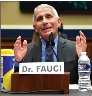  ?? (AP/Kevin Dietsch) ?? In his testimony to lawmakers Tuesday, Dr. Anthony Fauci painted a darker picture of the coronaviru­s threat than President Donald Trump has presented. More photos at arkansason­line.com/624virus/.