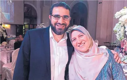  ?? AMAL AHMED ALBAZ ?? Authoritie­s took Yasser Ahmed Albaz (shown with his wife) from a Cairo airport and seized his passport, according to his family.