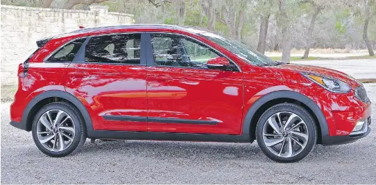  ?? GRAEME FLETCHER ?? The Kia Niro hybrid delivered fuel economy on a combined city/highway test drive of 5.4L/100 km — better than the manufactur­er promises.