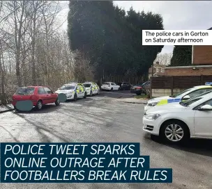  ??  ?? The police cars in Gorton on Saturday afternoon