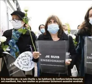  ??  ?? À la manière de « Je suis Charlie », les habitants de Conflans-Sainte-Honorine ont manifesté, hier, leur soutien au professeur lâchement assassiné vendredi.