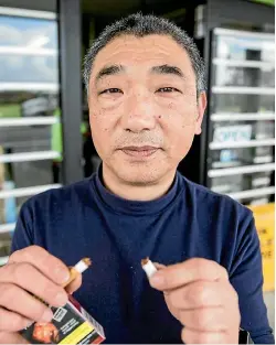  ?? CHRISTEL YARDLEY/STUFF ?? Te Kowhai Food Centre owner Tao Liu has had enough of being robbed so he is making a bold move and ridding his store of cigarettes.