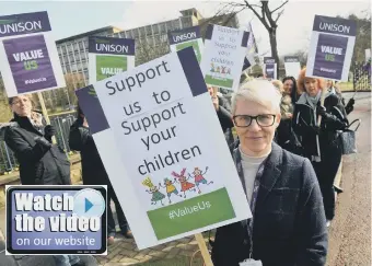  ??  ?? Unison organiser Helen Metcalf with teaching assistants protesting outside County Hall Durham.