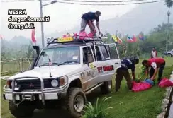  ??  ?? MESRA dengan komuniti Orang Asli.