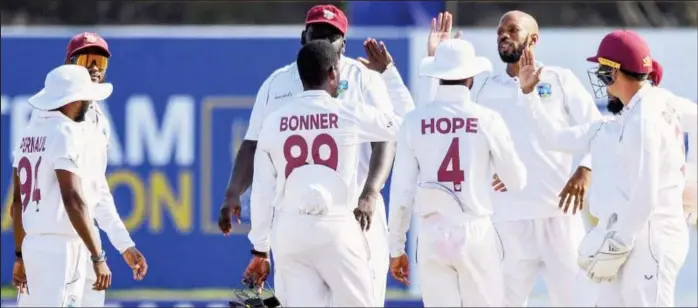  ?? ?? Roston Chase took a five wicket haul but the West Indies batting crumbled leaving the hosts with a tough task of saving the first test against Sri Lanka.