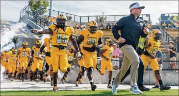  ?? CORY HANCOCK / SPECIAL TO THE AJC ?? Coach Brian Bohannon has become a hot commodity as Kennesaw State’s football team has climbed to 23rd in the FCS rankings. He’s viewed as a likely candidate for the Georgia Southern job.