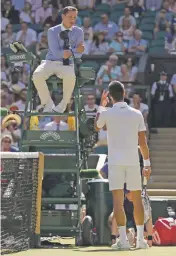  ??  ?? Serbia’s Novak Djokovic, right, argues a call with umpire Jake Garner on Saturday at Wimbledon in London.